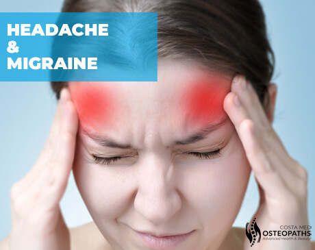 Close-up of a woman holding her head in pain with red areas at temples, representing headache