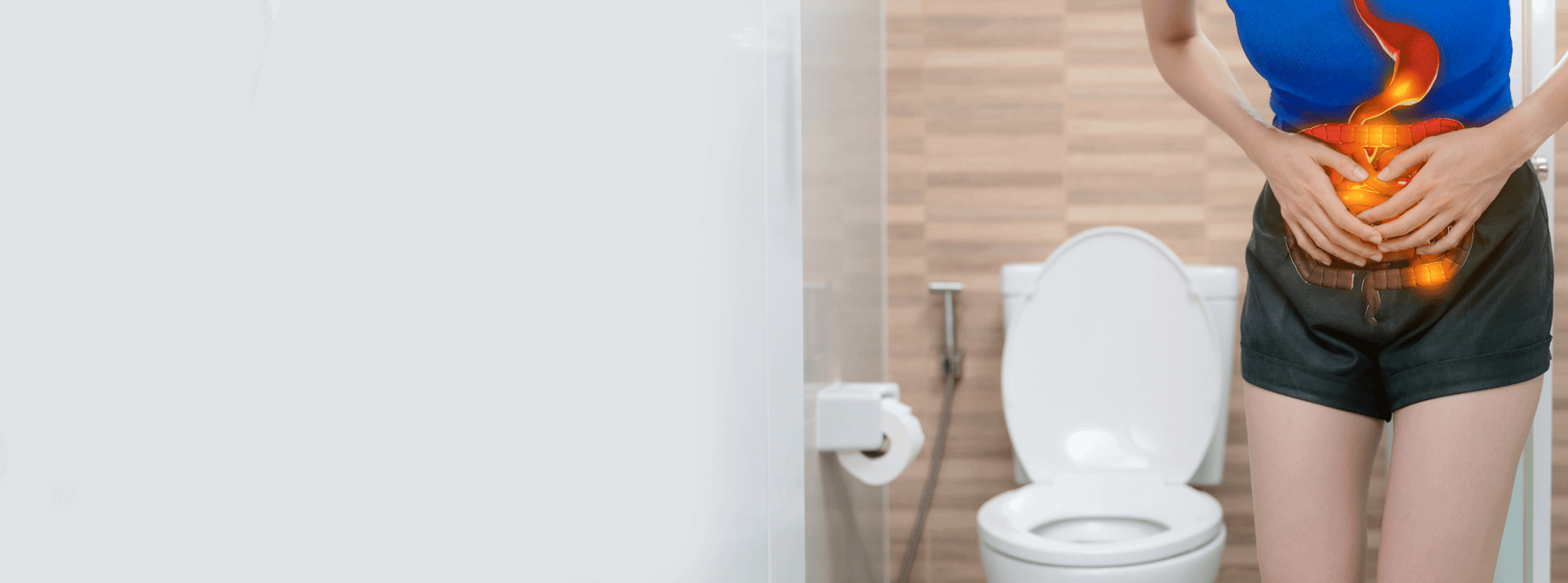 Woman clutching her stomach in front of a toilet, with digital overlay of inflamed digestive tract