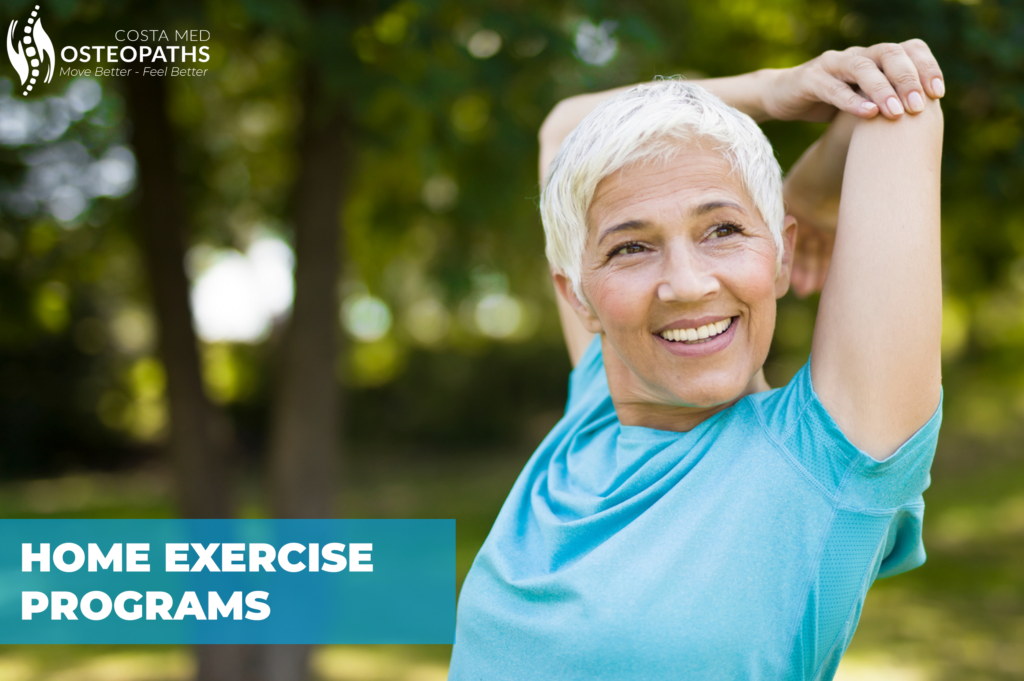Smiling senior woman stretching outdoors in a turquoise top during a home exercise session
