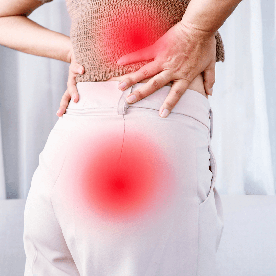 Close-up of woman with hip and lower back pain, highlighted with red glow.
