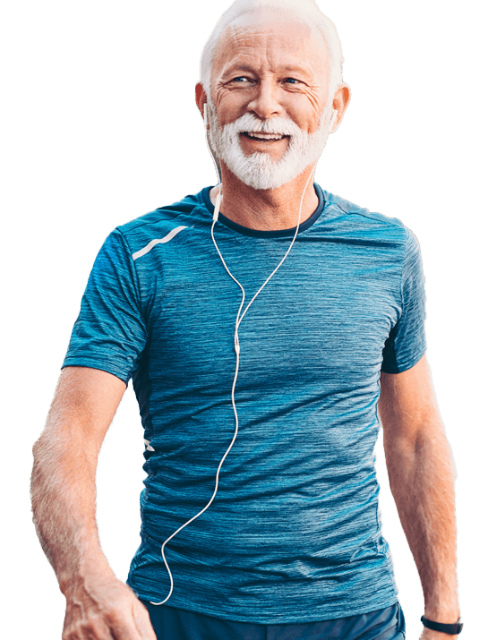 Active older man walking with earphones, smiling confidently.